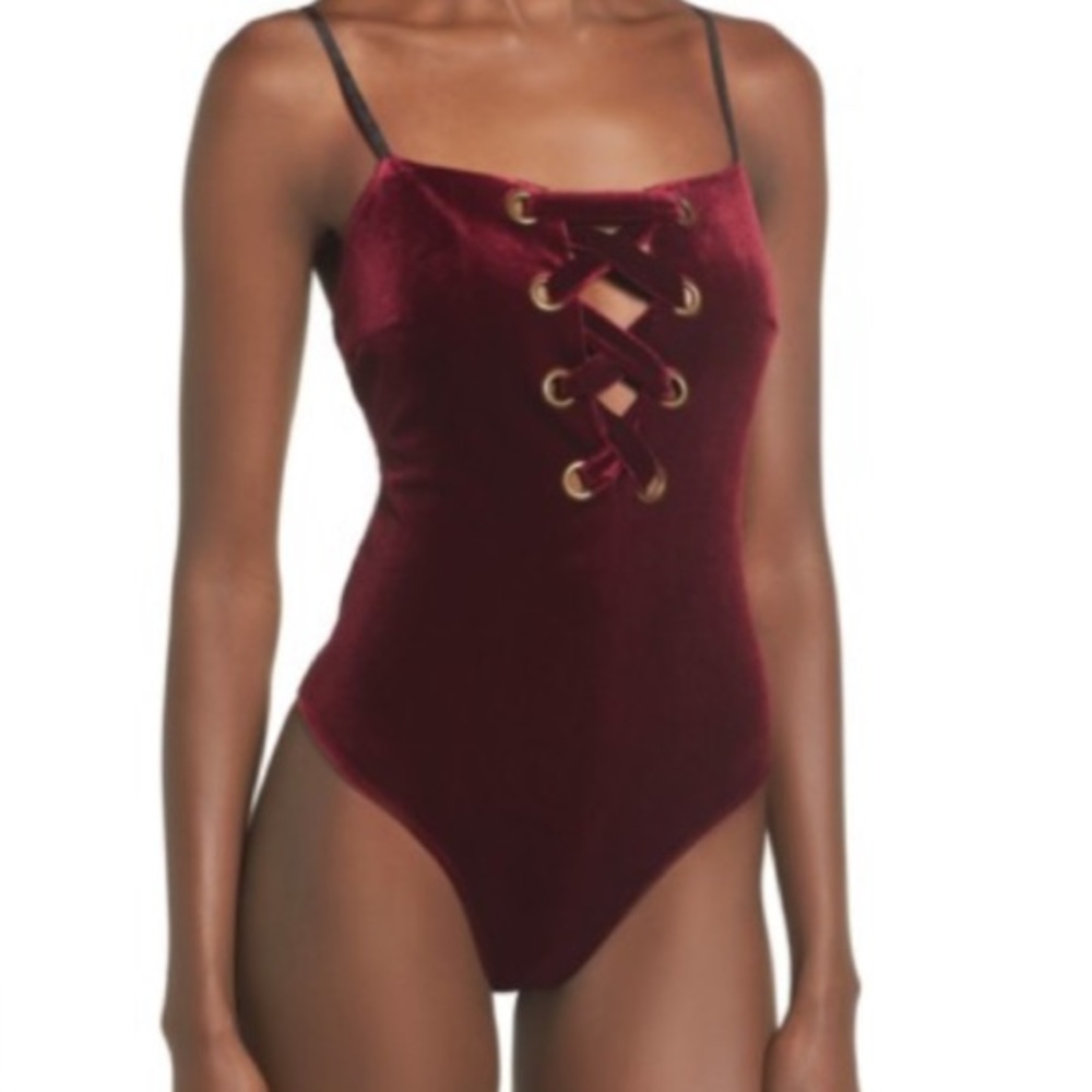 Burgundy lace up velvet bodysuit.